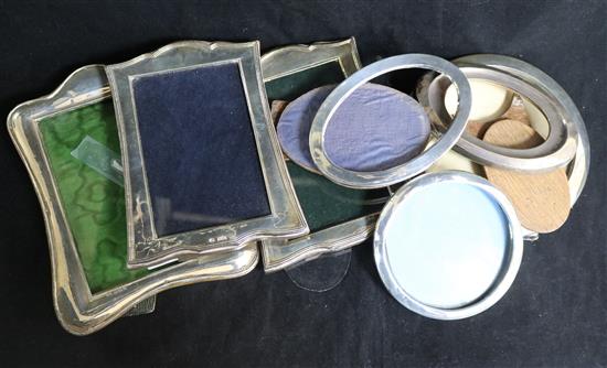 A group of seven assorted silver mounted photograph frames.